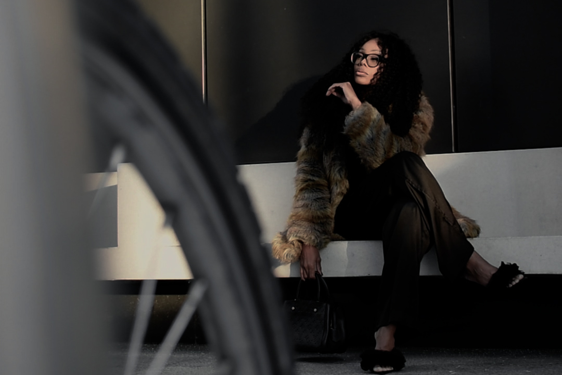 Bess Obarotimi sitting on a bench