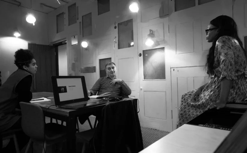 Senior leaders in a meeting discussing decision-making, governance, and execution in an organisational setting